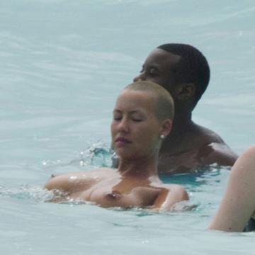 Amber Rose bares sexy tits