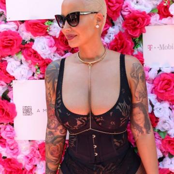 Amber Rose showing off big cleavage