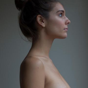 Caitlin Stasey showing off her stunning boobs