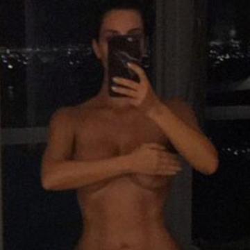 kim-kardashian-topless-and-booty-photos-23