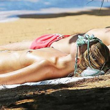 Margot Robbie Topless Sunbathing In Hawaii