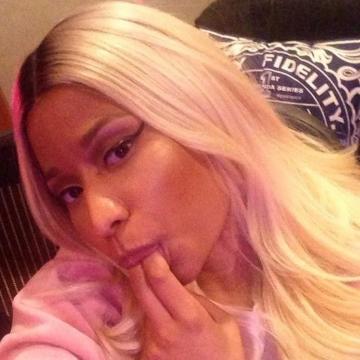 Nicki Minaj licking her own fingers