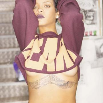 Rihanna almost topless