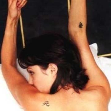 Angelina Jolie goes topless