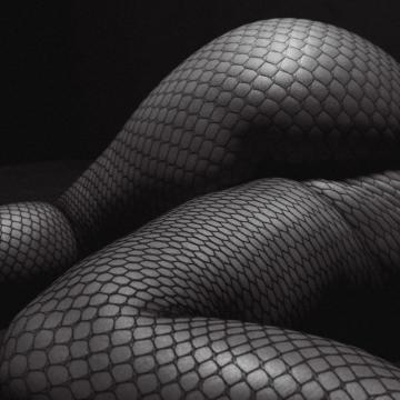 Ashley Graham sexy fishnet ass