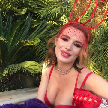 Bella Thorne cleavage erupts from sexy lingerie