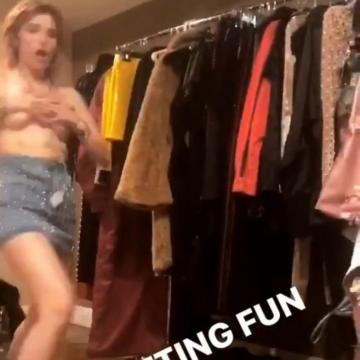 Bella Thorne covers nude tits with hands