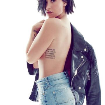 Demi Lovato wears jeans and goes topless