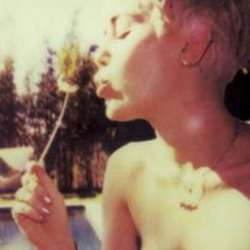 Miley Cyrus perky tits exposed