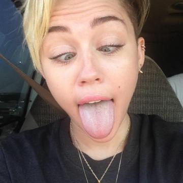 Miley Cyrus shows her tongue