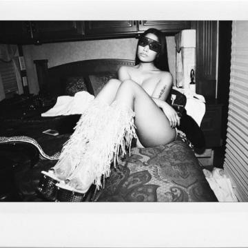 Nicki Minaj goes topless