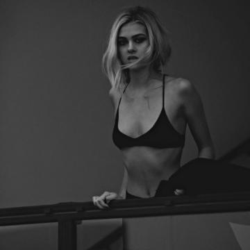 Nicola Peltz sexy black bikini cleavage