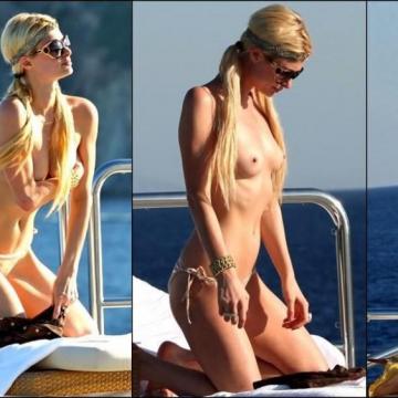 Paris Hilton exposes nude tits