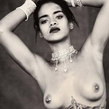 Rihanna flashes bare boobs