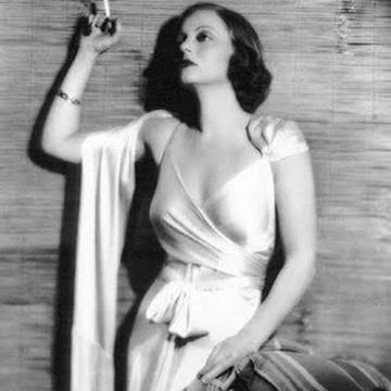 Tallulah Bankhead shows sexy legs