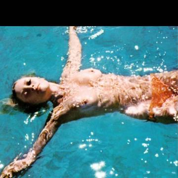 Brigitte Bardot showing her naked body