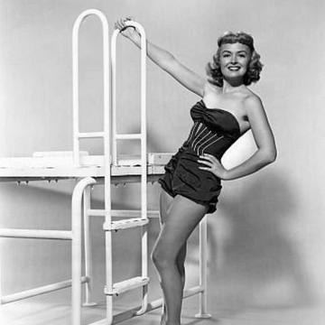 Donna Reed shows off her incredible curves in sexy lingerie