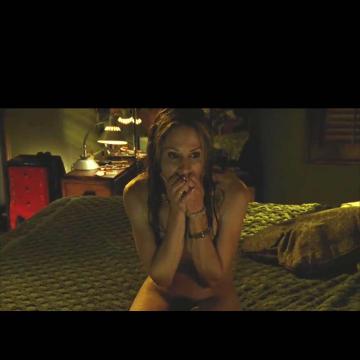 Holly Hunter nude on the bed