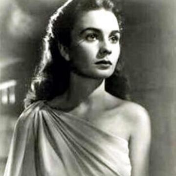 Jean Simmons shows massive cleavage