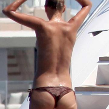 Toni Garrn shows nude ass