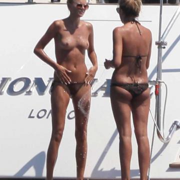 Toni Garrn topless in public